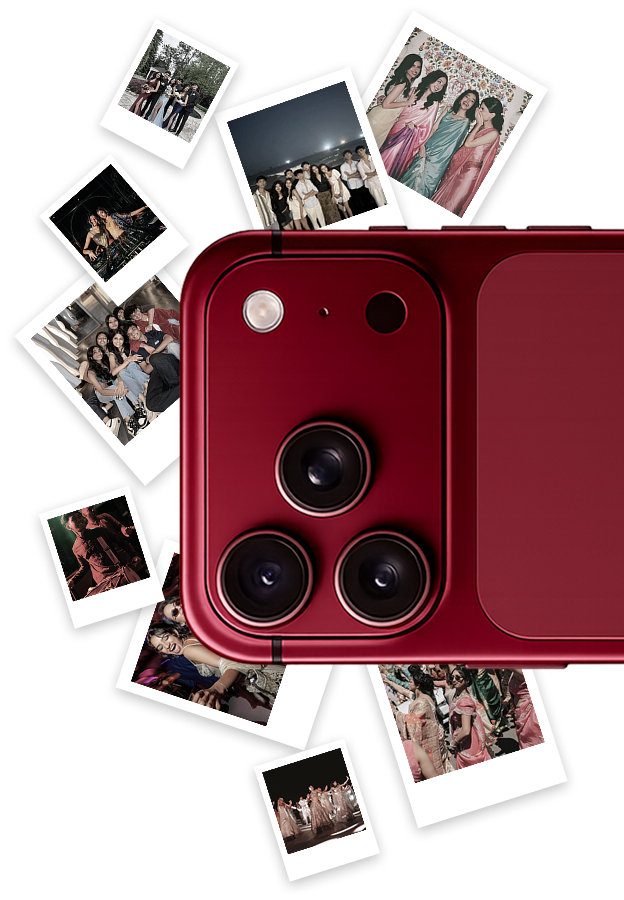 Red phone camera surrounded by printed celebration photos.